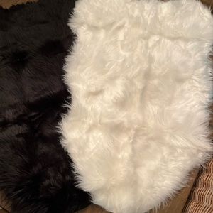 2 FAUX FUR RUGS NEVER USED!